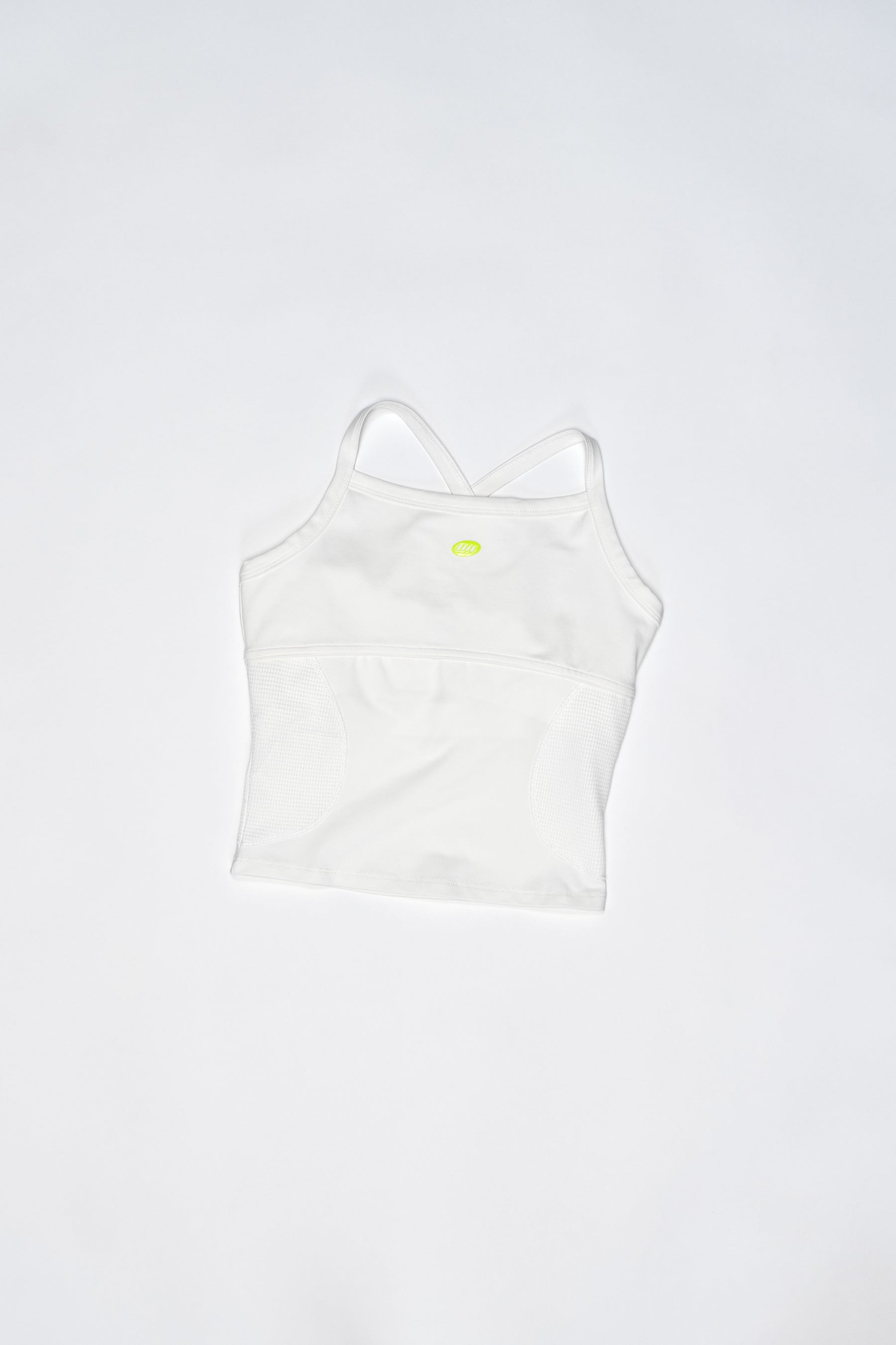 White tank top with a small yellow logo on a white background