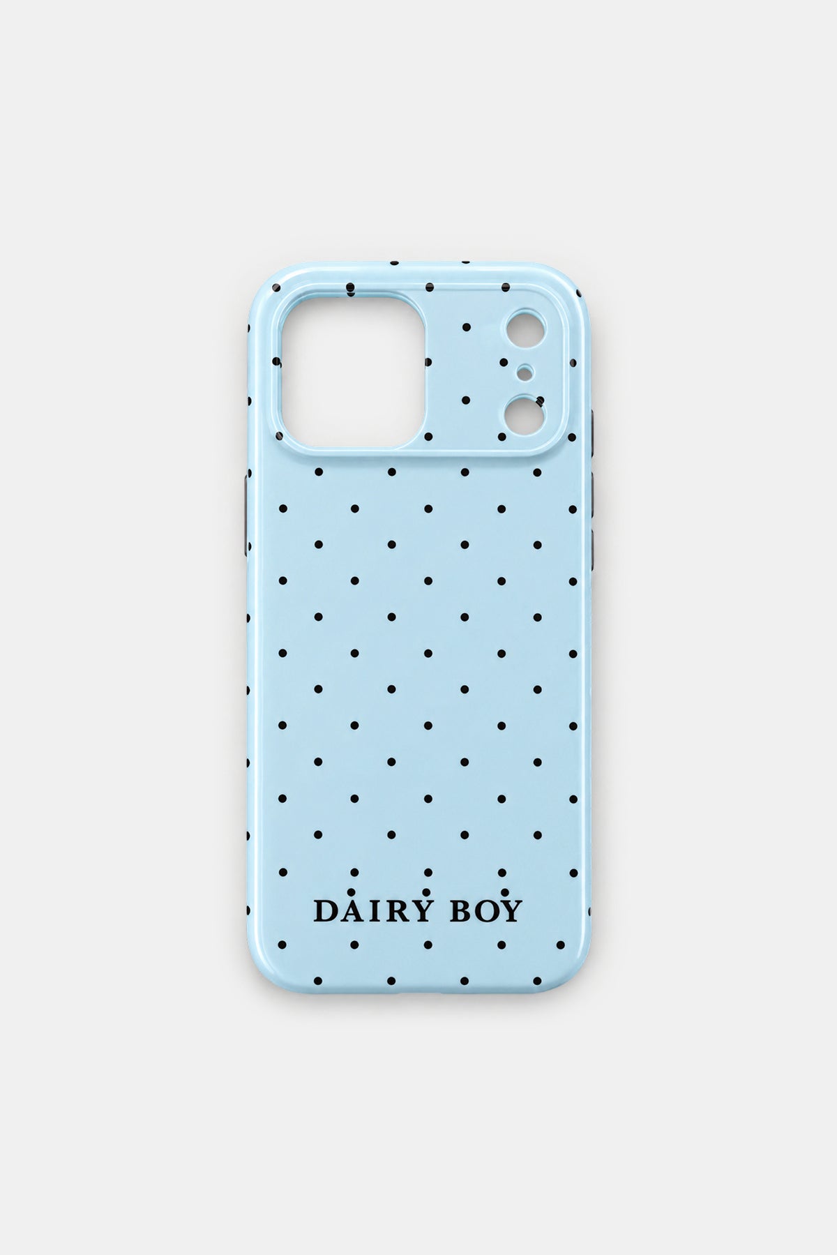 Back view of a glossy light blue phone case with a black polka dot pattern, a camera cutout and "DAIRY BOY" lettering near the bottom.