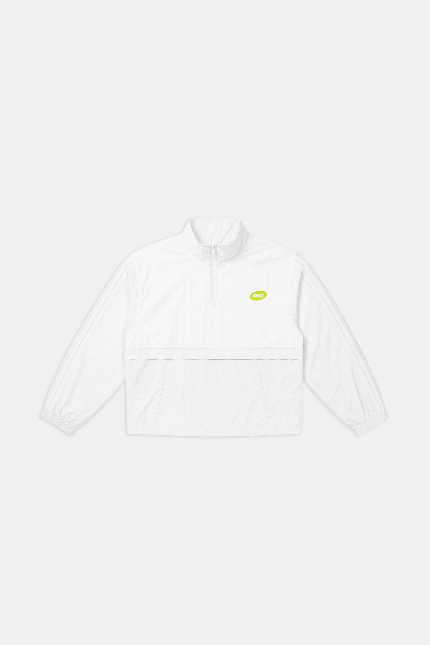 A white long-sleeve half-zip pullover jacket with a small lime green logo on the left chest, displayed flat against a light gray background.