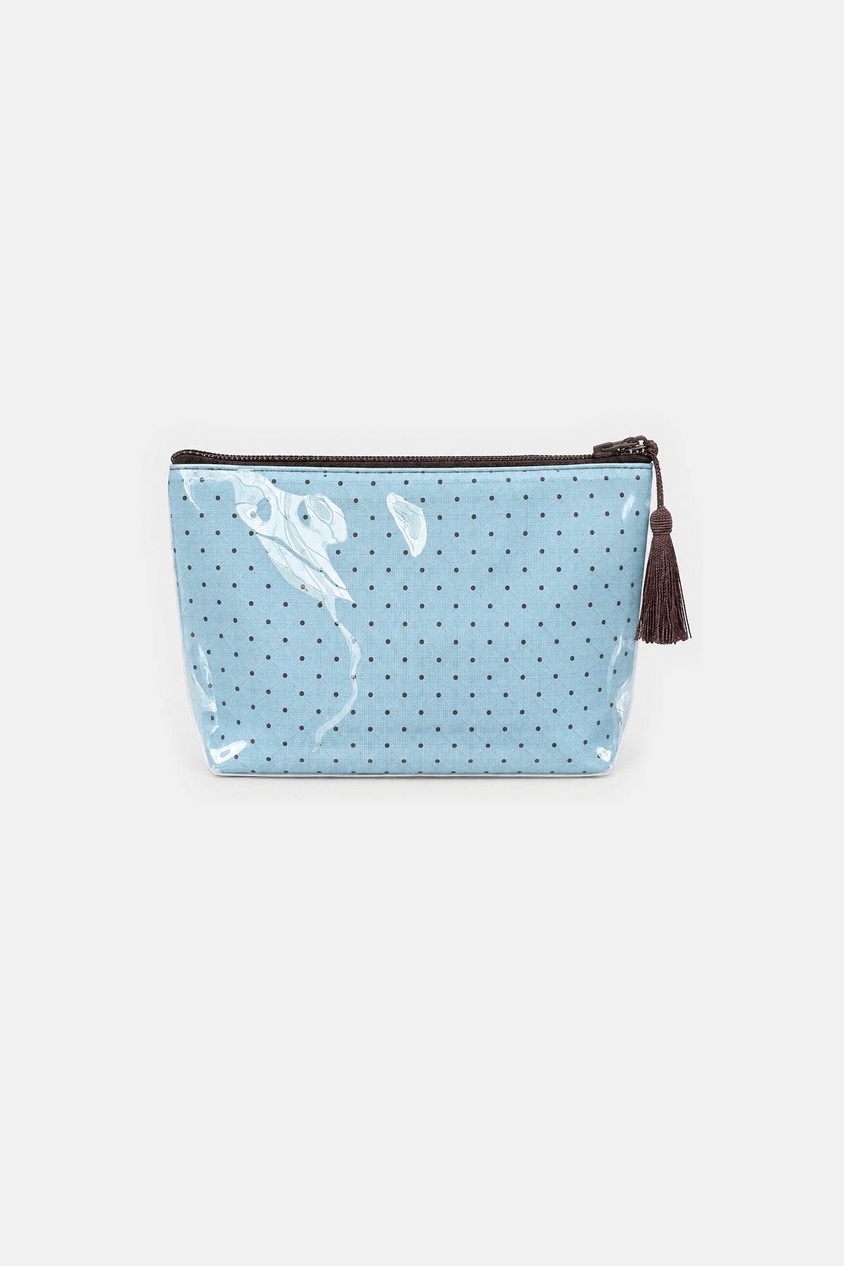 Flat front view of a light blue makeup pouch with small dark dots, a brown top zip and a brown tassel pull, under clear glossy cover.
