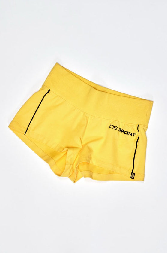 Yellow athletic shorts with navy piping details on a white background