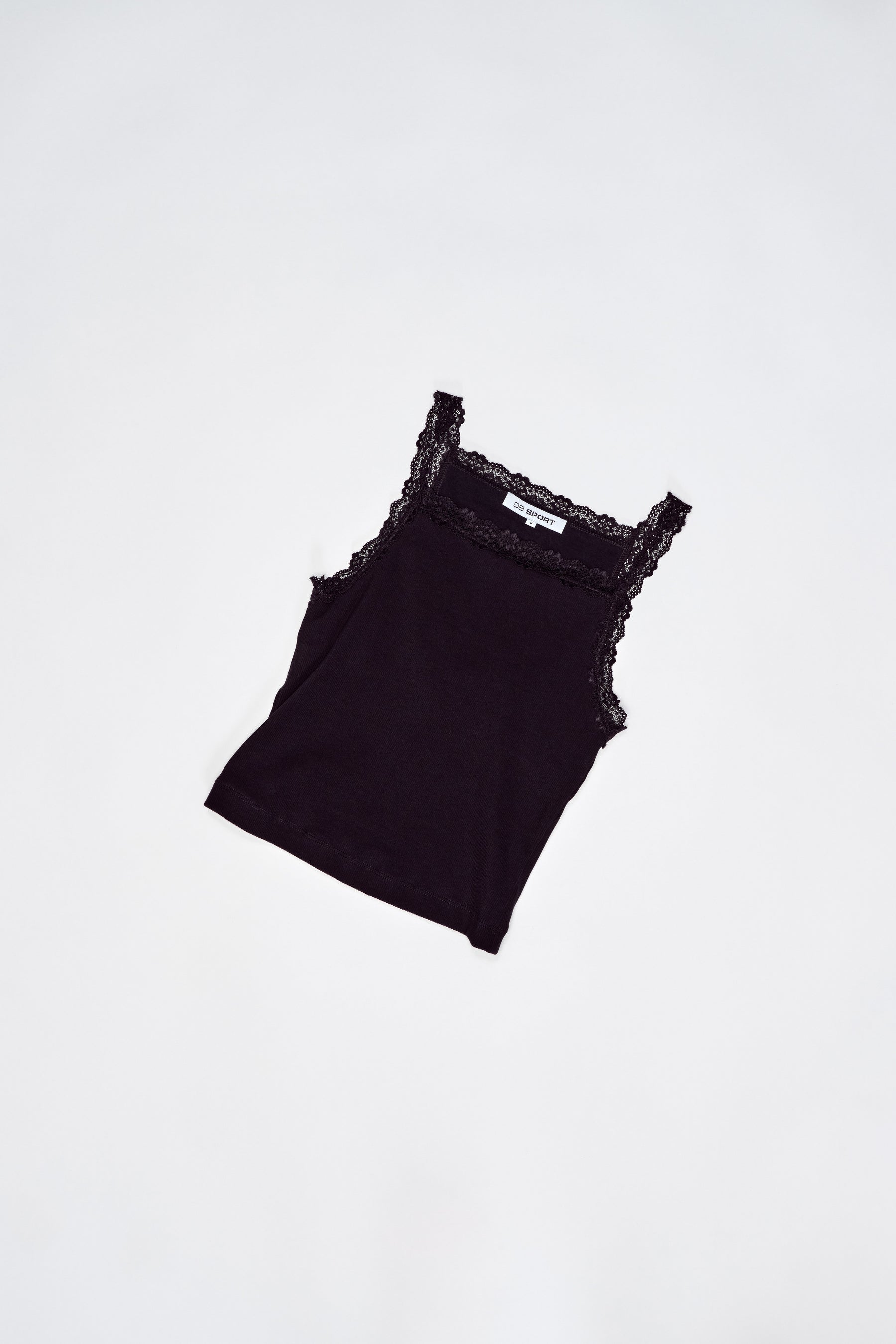 Black tank top with lace details on a white background