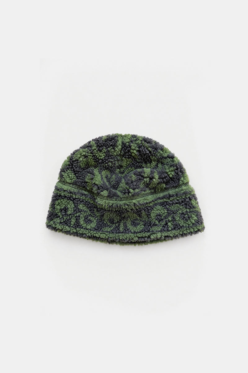 A dark green and black textured knit beanie hat with a subtle pattern, displayed on a clean white background.