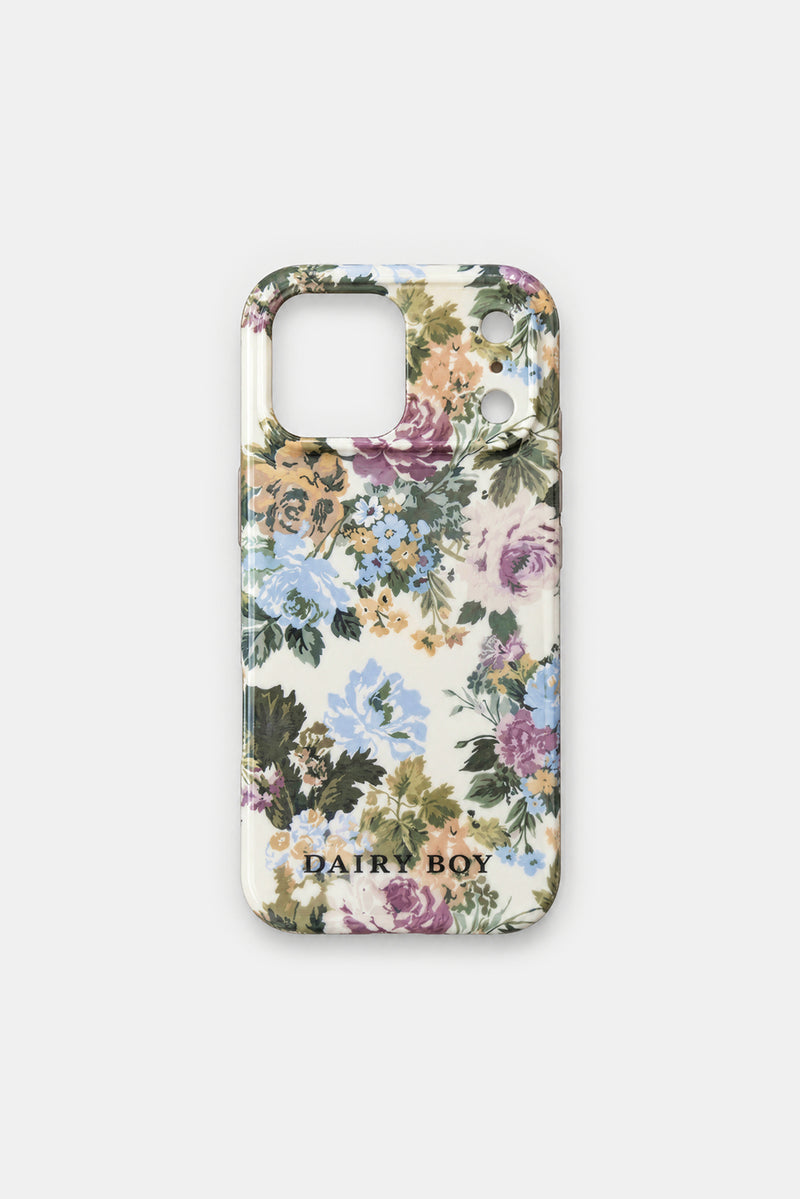 Back of a glossy phone case with a blue, purple and mustard floral pattern on cream, camera cutout and DAIRY BOY lettering.