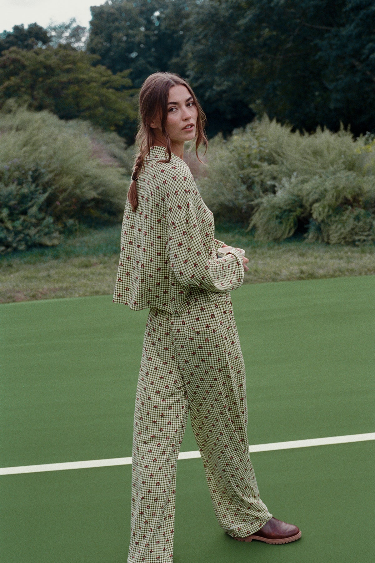 Green and cream gingham sleep set with a small red floral print, shown from the back on a model: cropped long-sleeve shirt and wide-leg pants. |M2