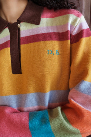 Multicolored striped sweater with 'D.B.' logo on chest
|M1