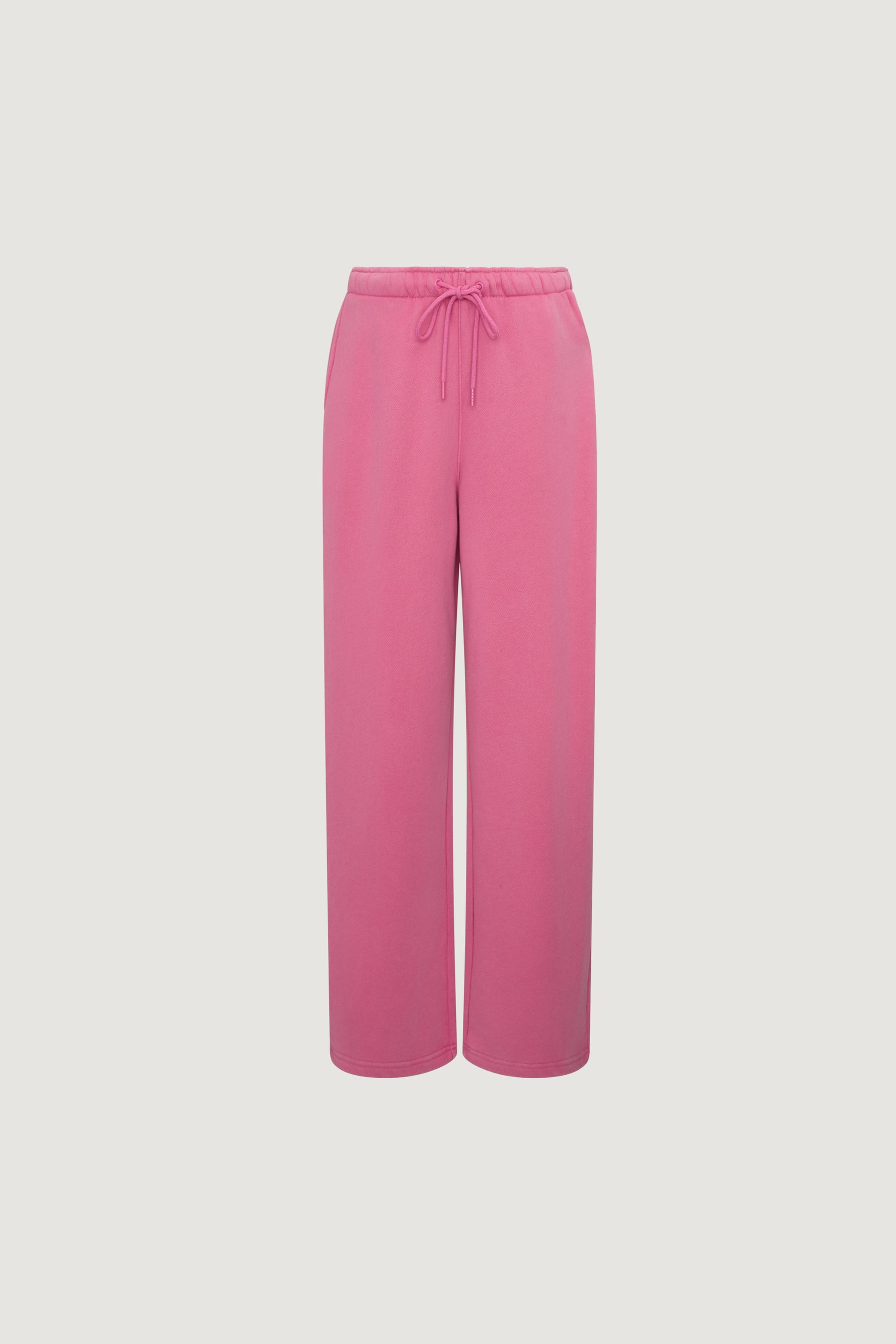 The Dairy Boy Milk Bottle Sweatpant in Strawberry Milk features a wide-leg design with an elastic waistband and drawstring, shown against a plain white background.