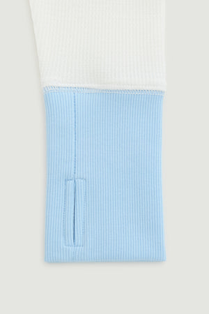 Light blue textured pocket on a white background