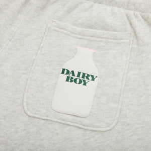 Gray sweatpant with a pocket featuring a white graphic of a milk bottle labeled 'Dairy Boy'.