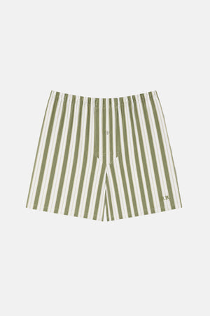 Green and white striped shorts on a light gray background